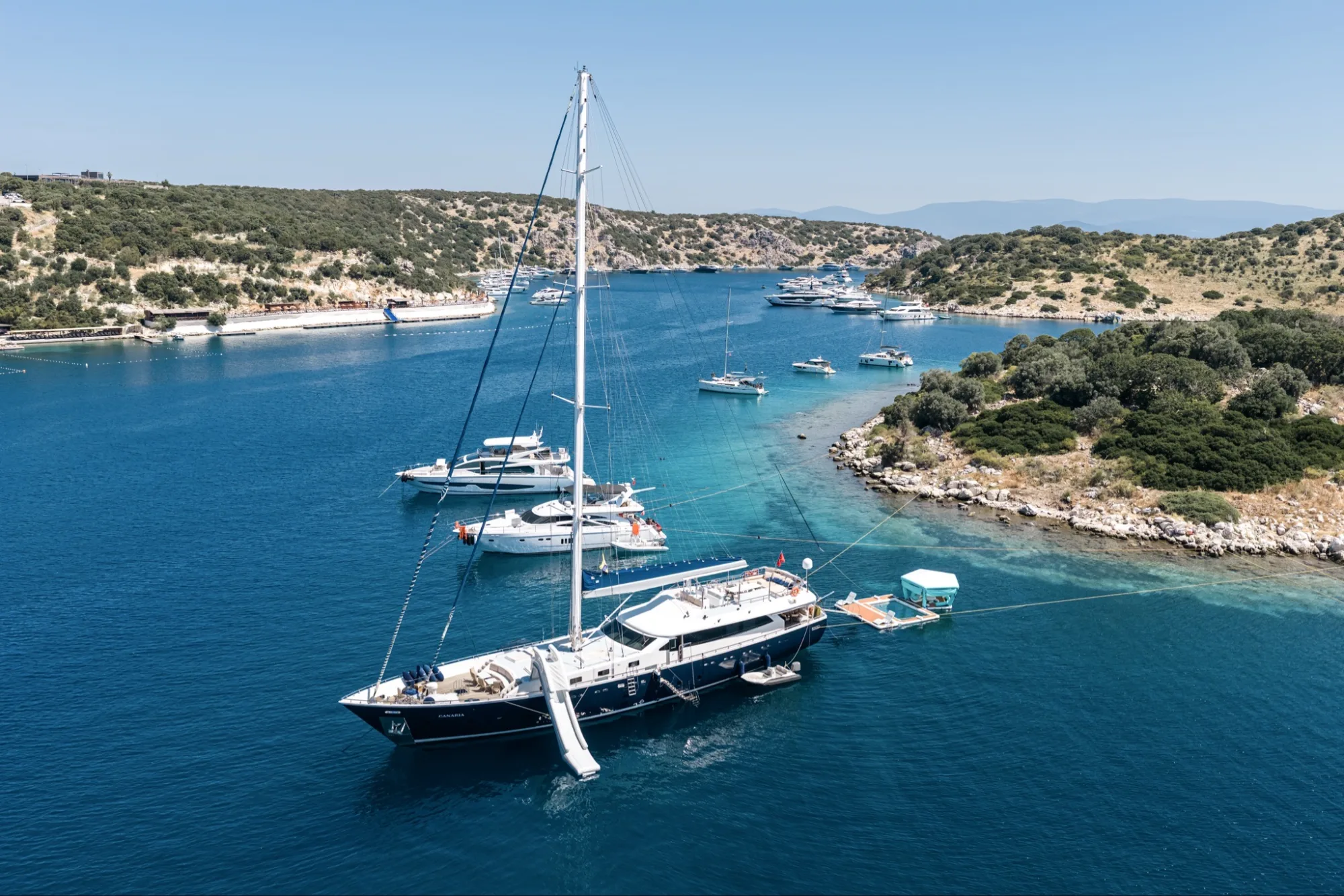The Aegean’s gentle embrace, a study in quiet luxury.