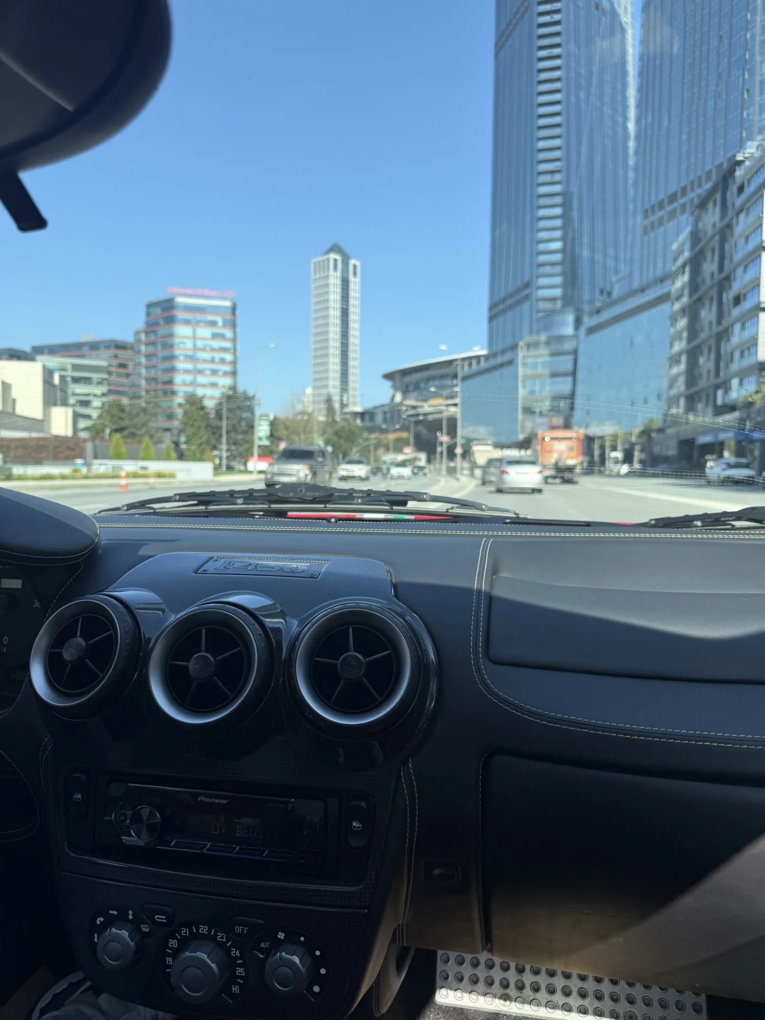 Kağıthane's rhythm through tinted panes.